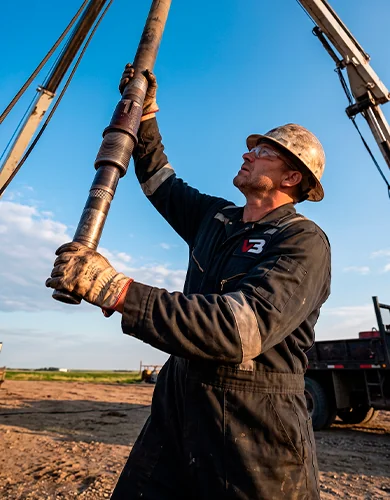 Technician guiding the logging tool
